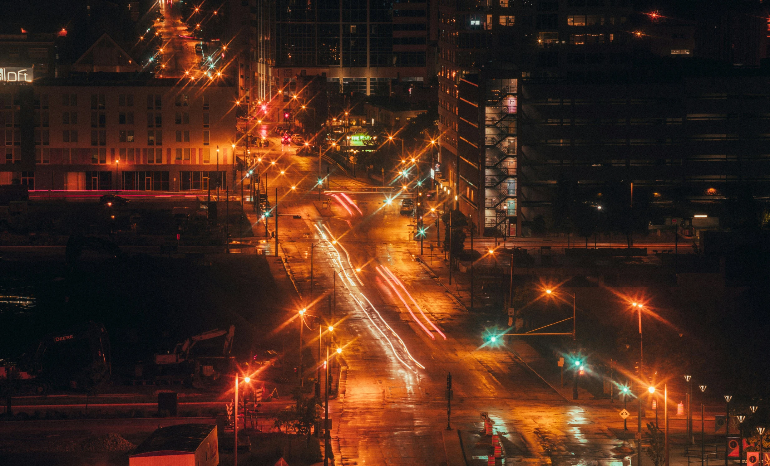 the view of traffic at night, looking down a street