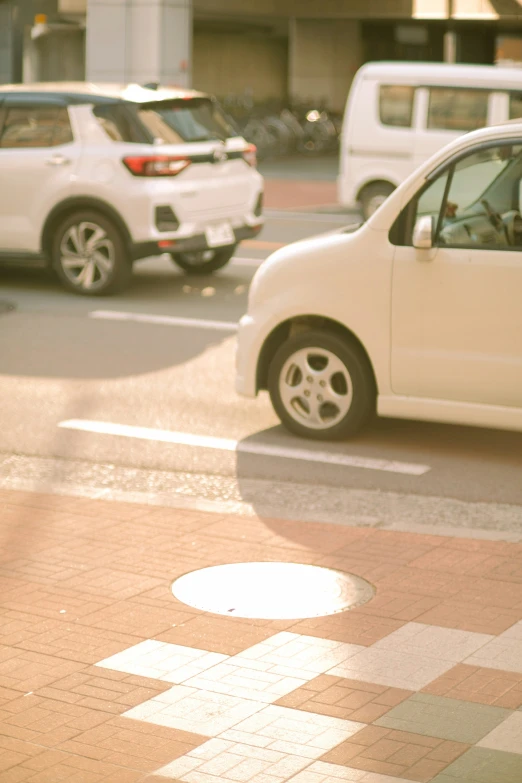 a couple of vehicles that are sitting in the street