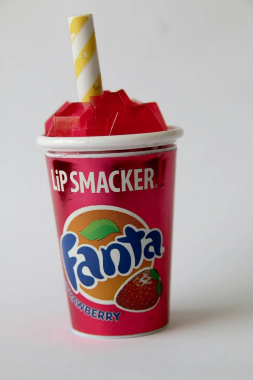 close up view of a paper cup with a drink inside