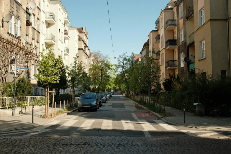 street in city area with several apartment buildings