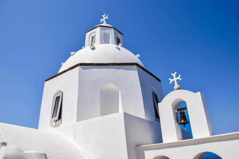 a church tower is shown with white architecture