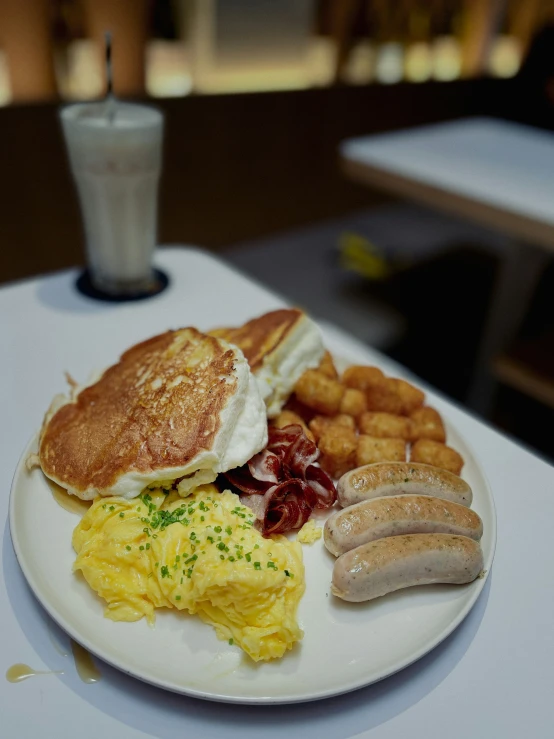 plate of food and drink sitting on a table