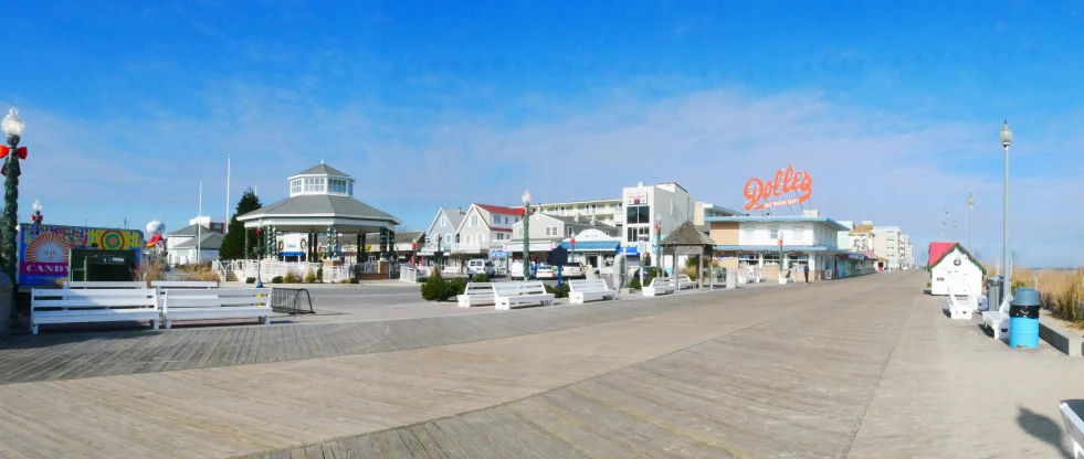 an empty street in front of many stores