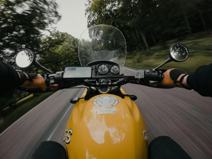view from the handlebars of a motorcycle from below