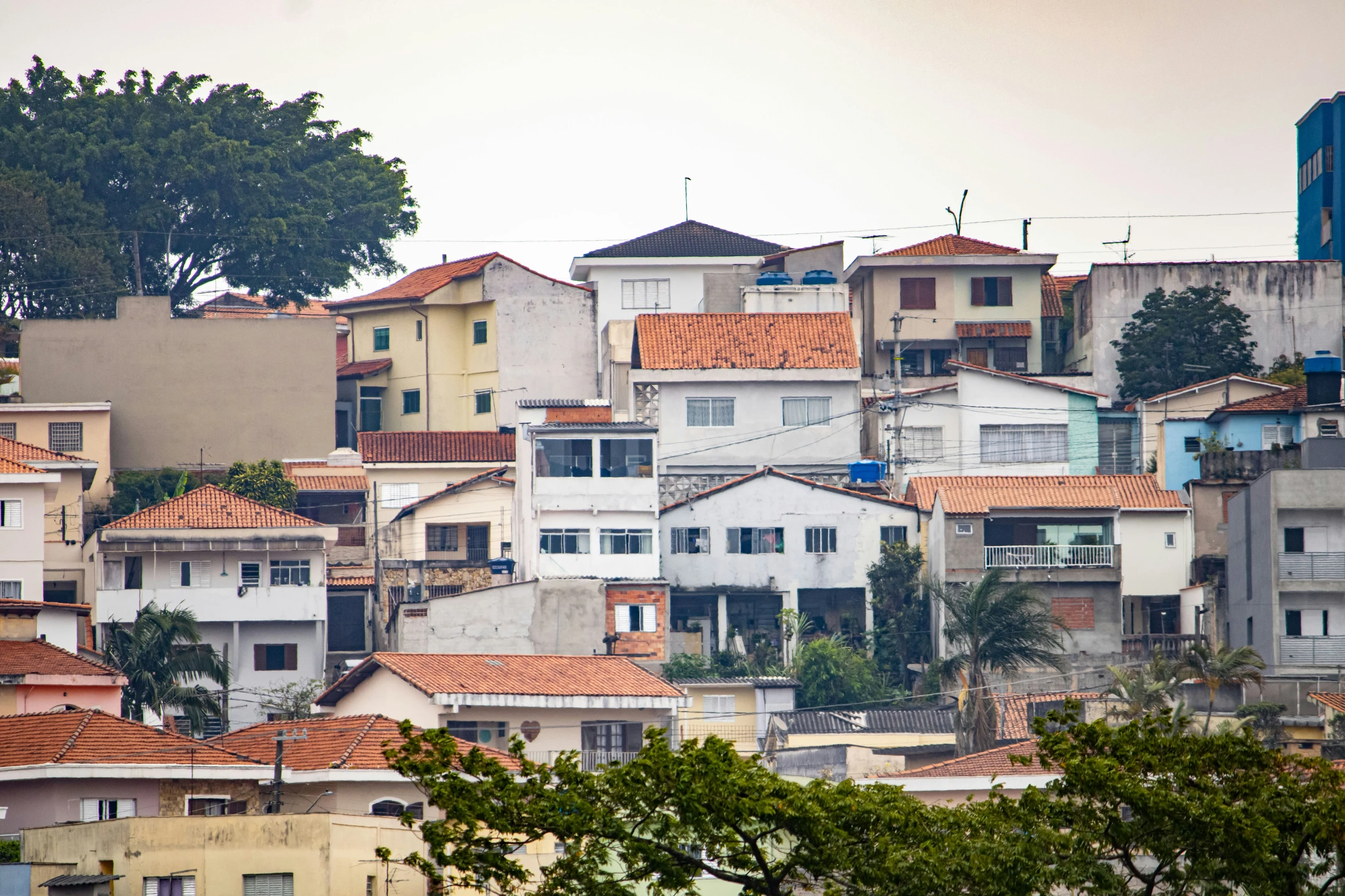 many homes are shown from the top of a hill