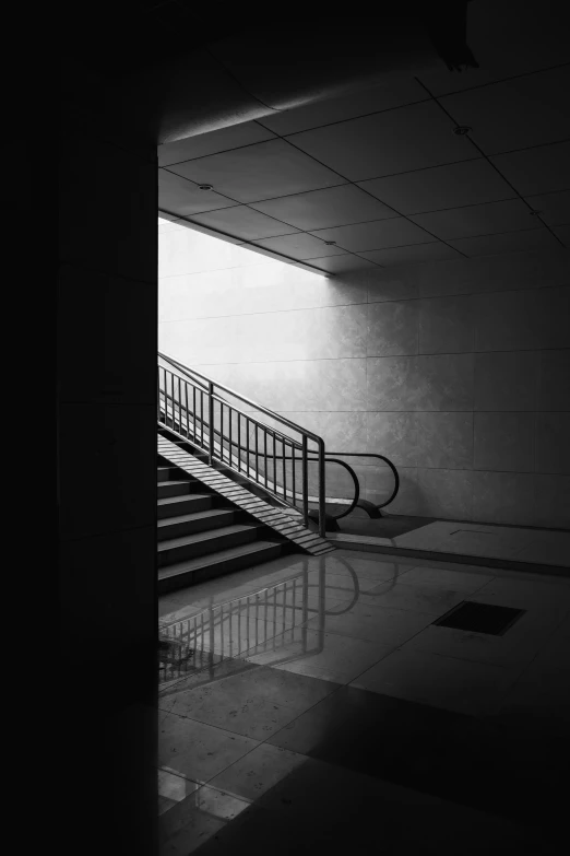 the stairwell leading to an empty subway