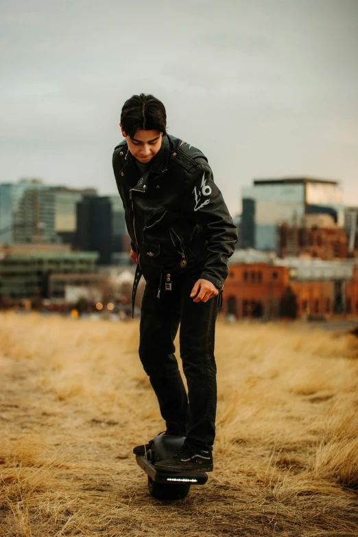 a man standing on a skate board outside