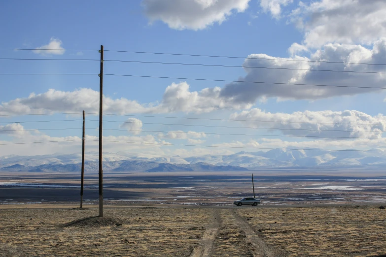 two cars parked in the middle of the desert