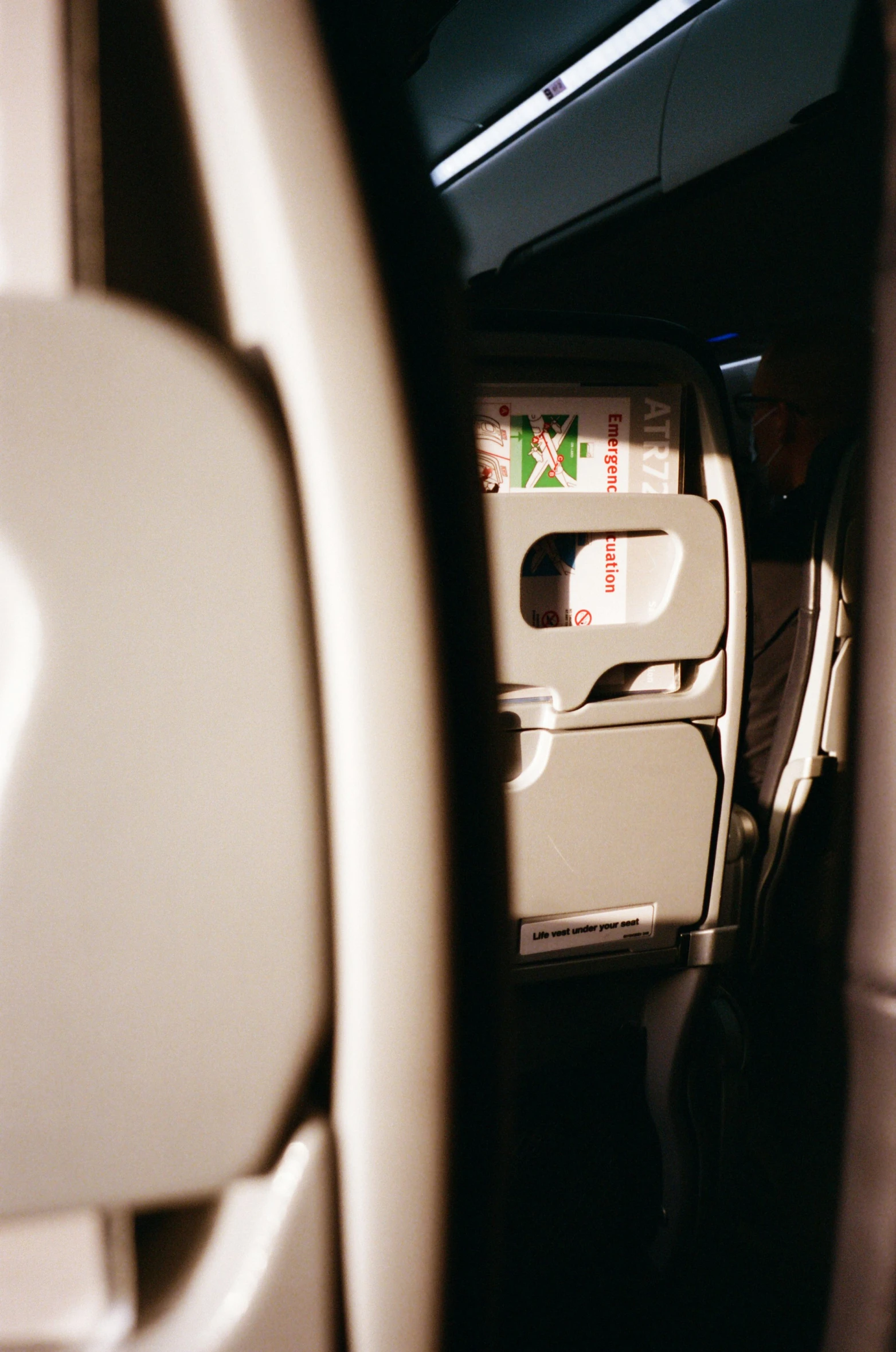 inside view of a car with the lights on and the interior door open