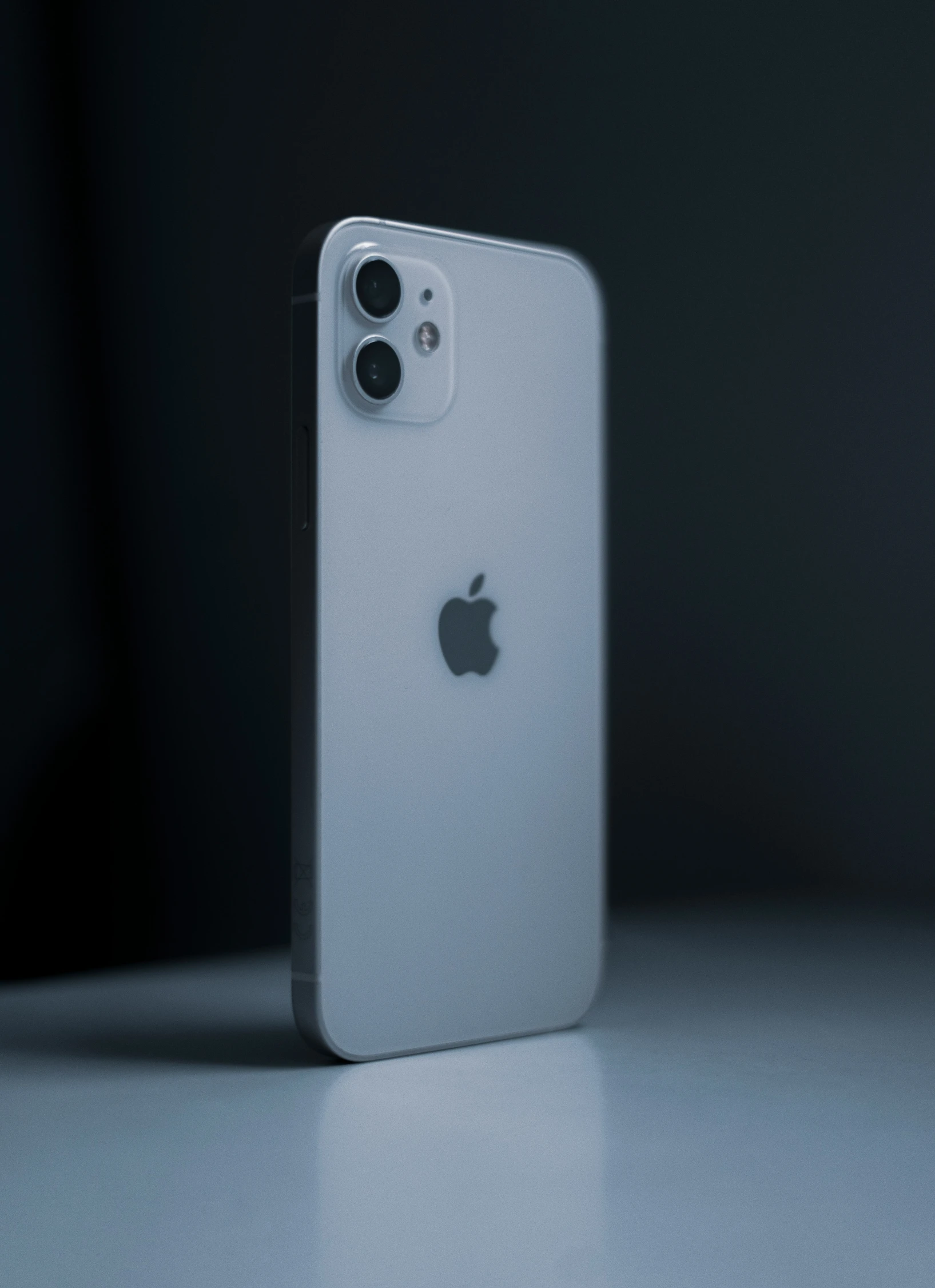 the new iphone 11 is in close proximity to the apple logo