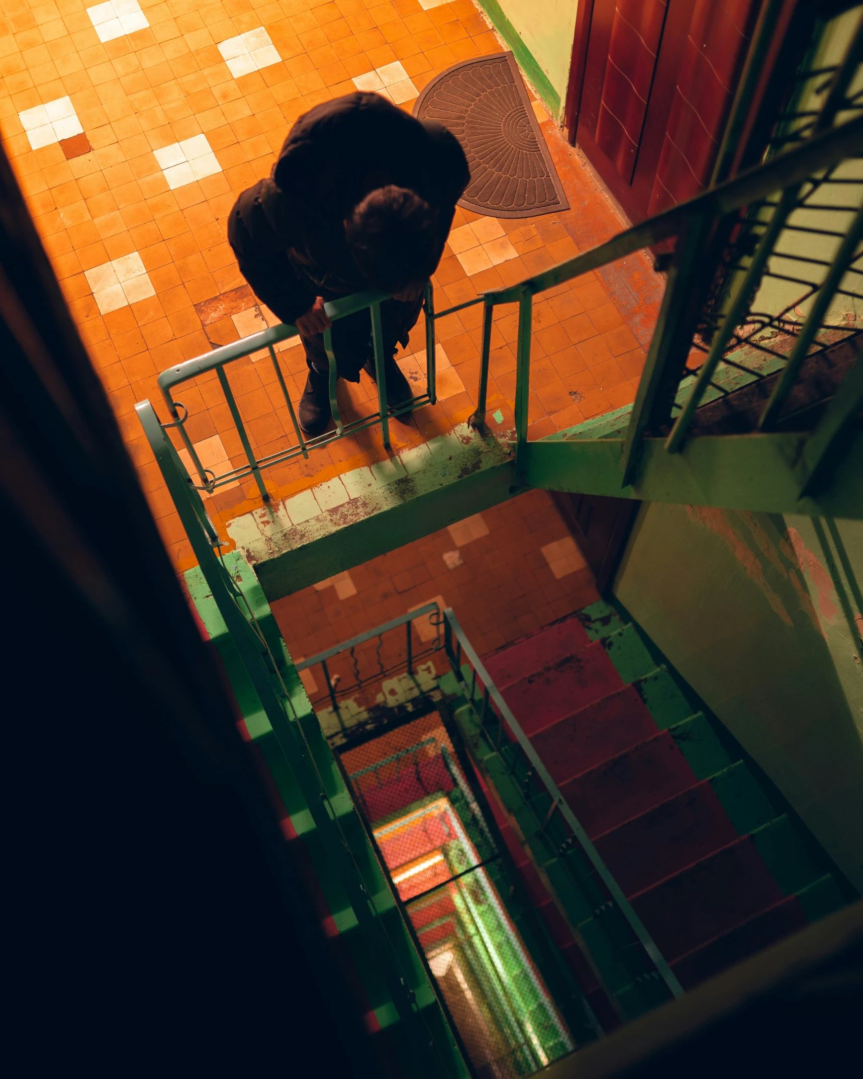 a view looking down at the top of a stair lift