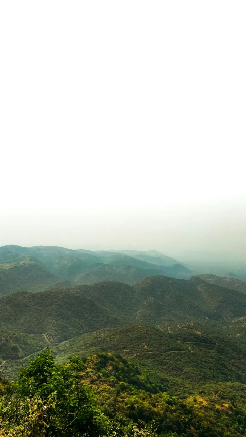 an image of a mountain landscape taken from the top of a mountain