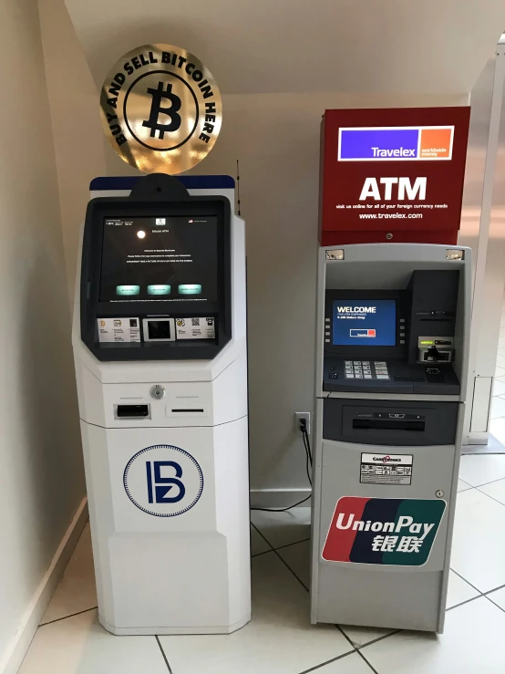 a atm, cash machine and a metal badge for bank de france