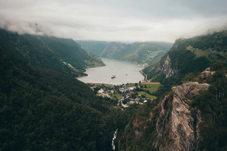 some cliffs and a river in the distance