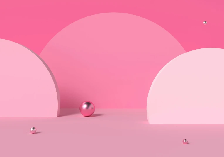 three spheres floating on a pink surface