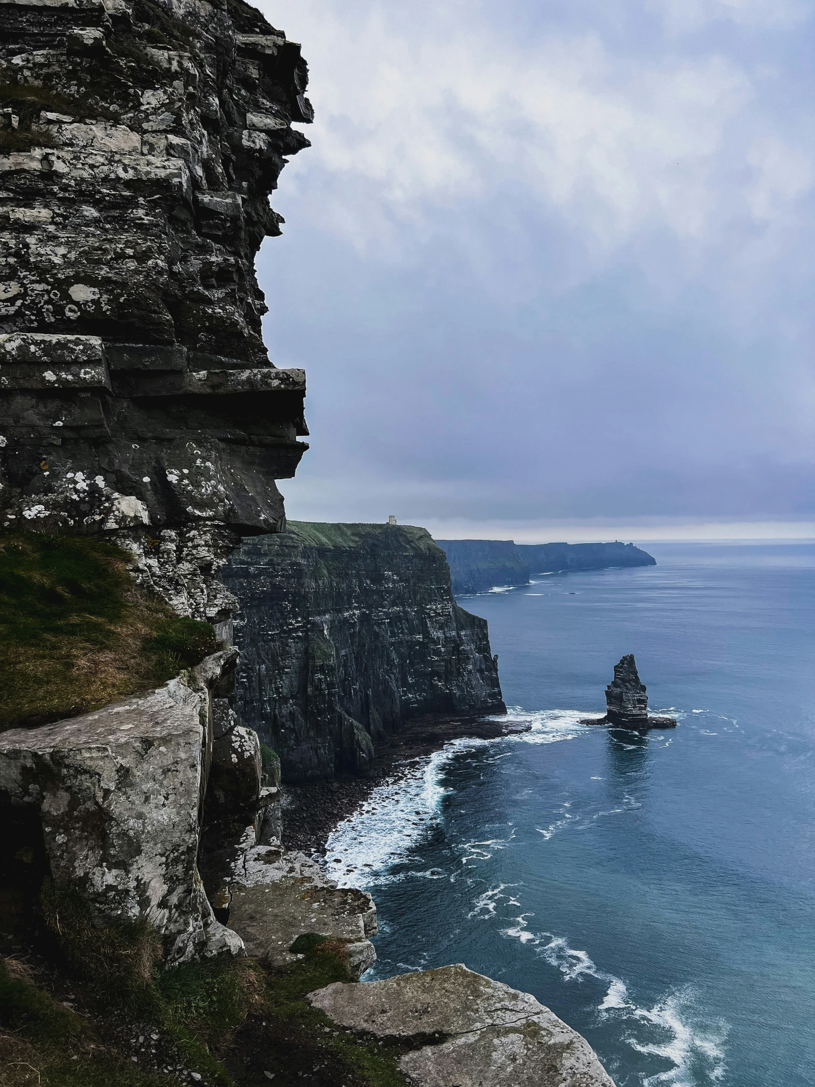 cliffs and cliffs with ocean in background