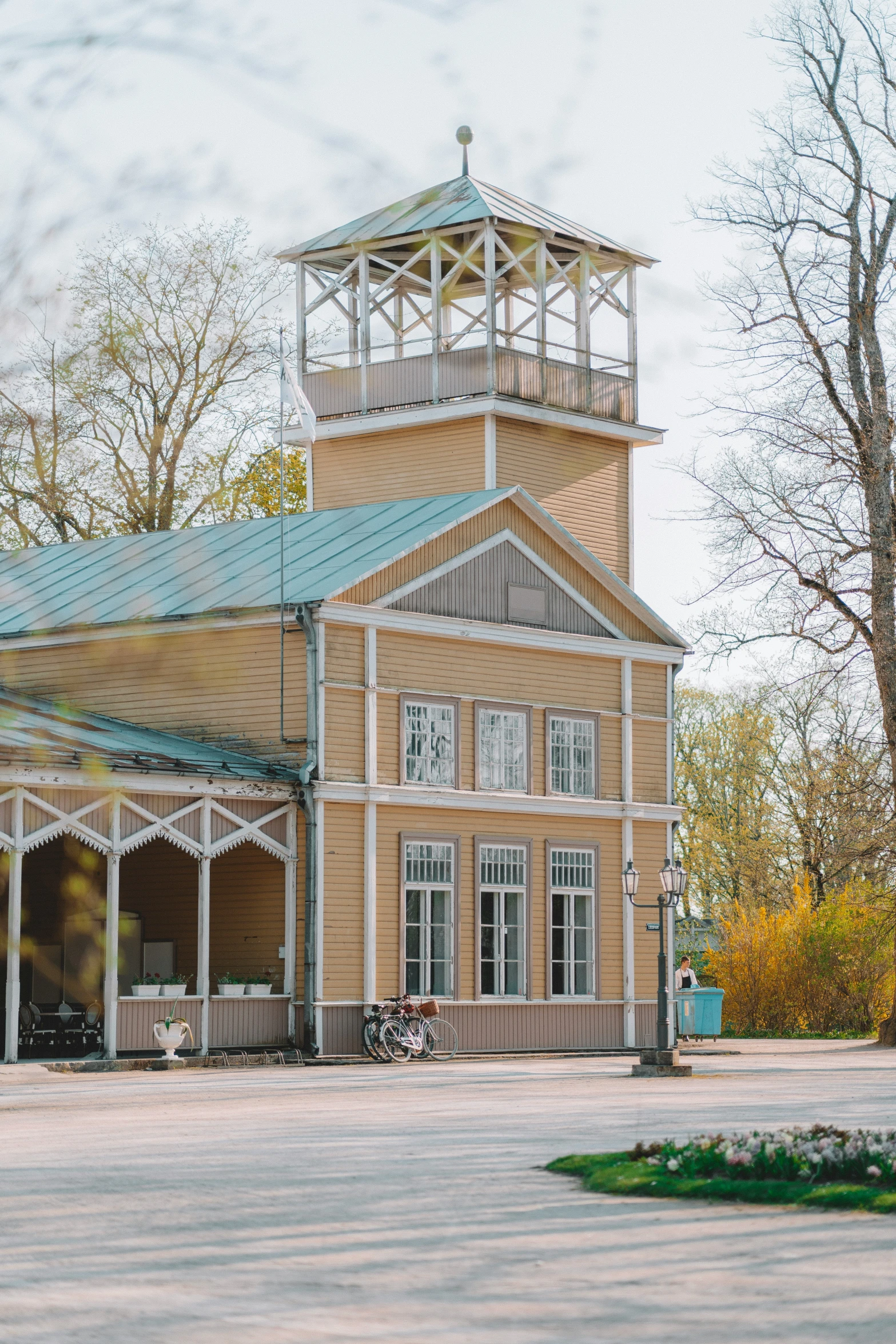 a church with a clock tower at the top of it