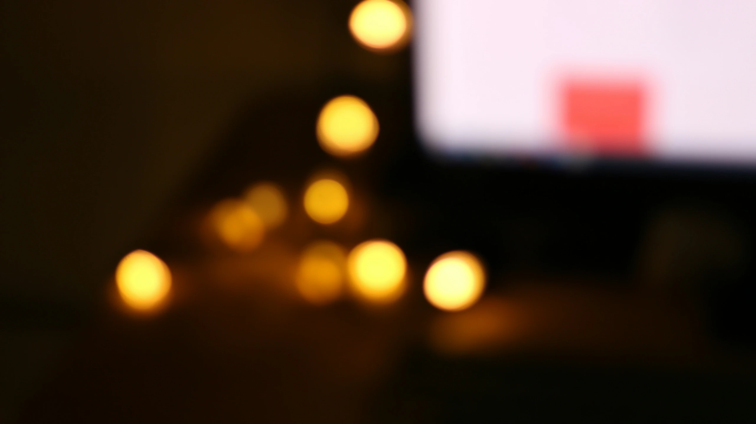 a view of several candles that are on the table