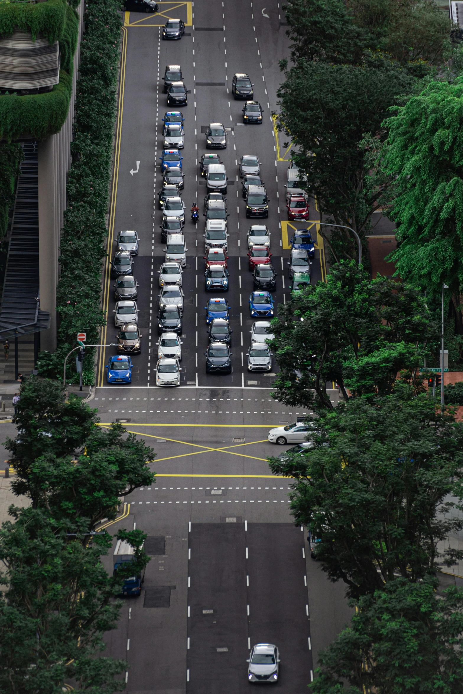 a city street with a few cars parked next to it