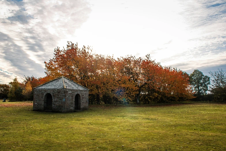 the park has a stone building next to it