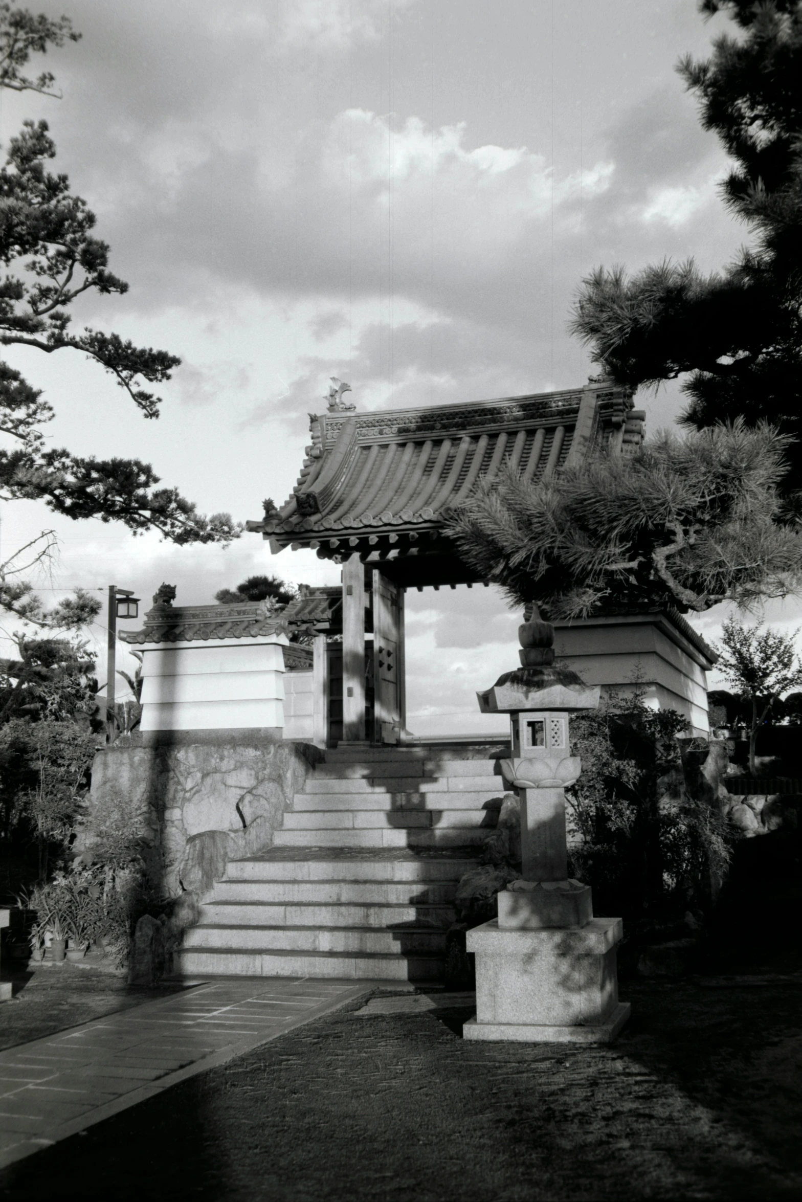 black and white po of steps with a chinese pagoda in the background