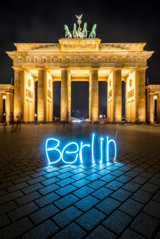 a close up of the name berlin with blue lights on