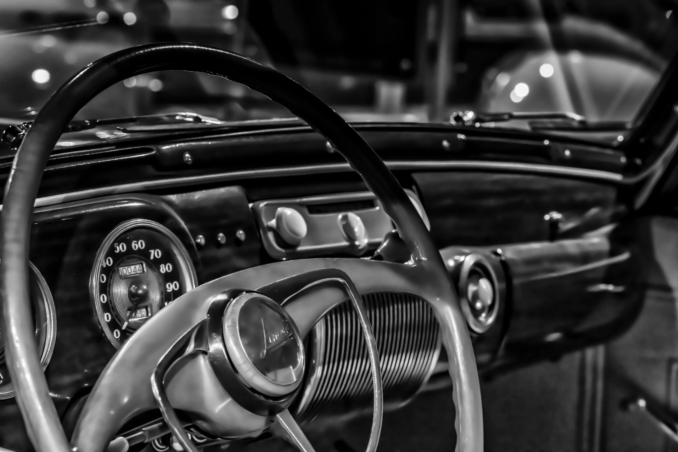 the interior of an old model car at night time