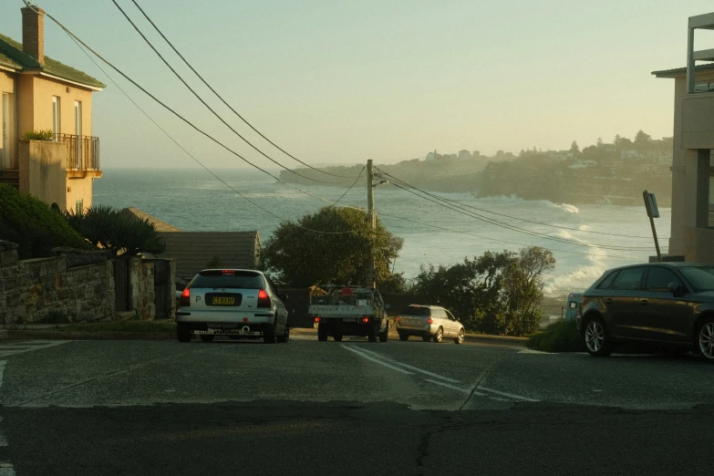 a view from the top of a hill, to the ocean