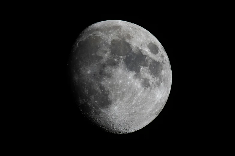 a large full moon against a dark sky