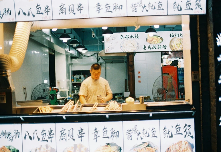 this is an image of a chef working in the kitchen