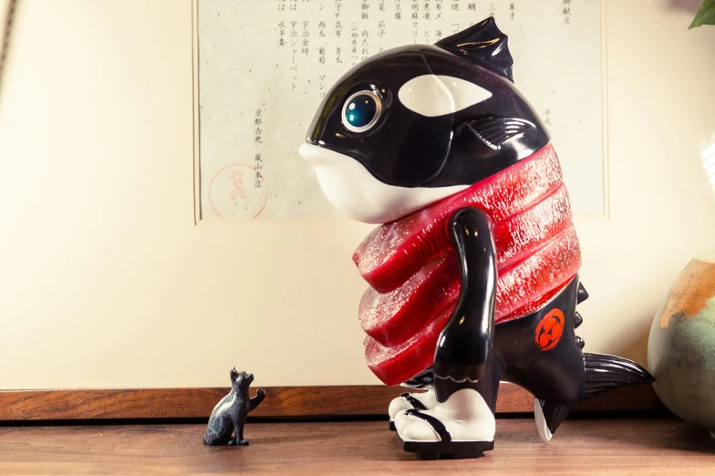 an abstractly decorated black and white cat sculpture