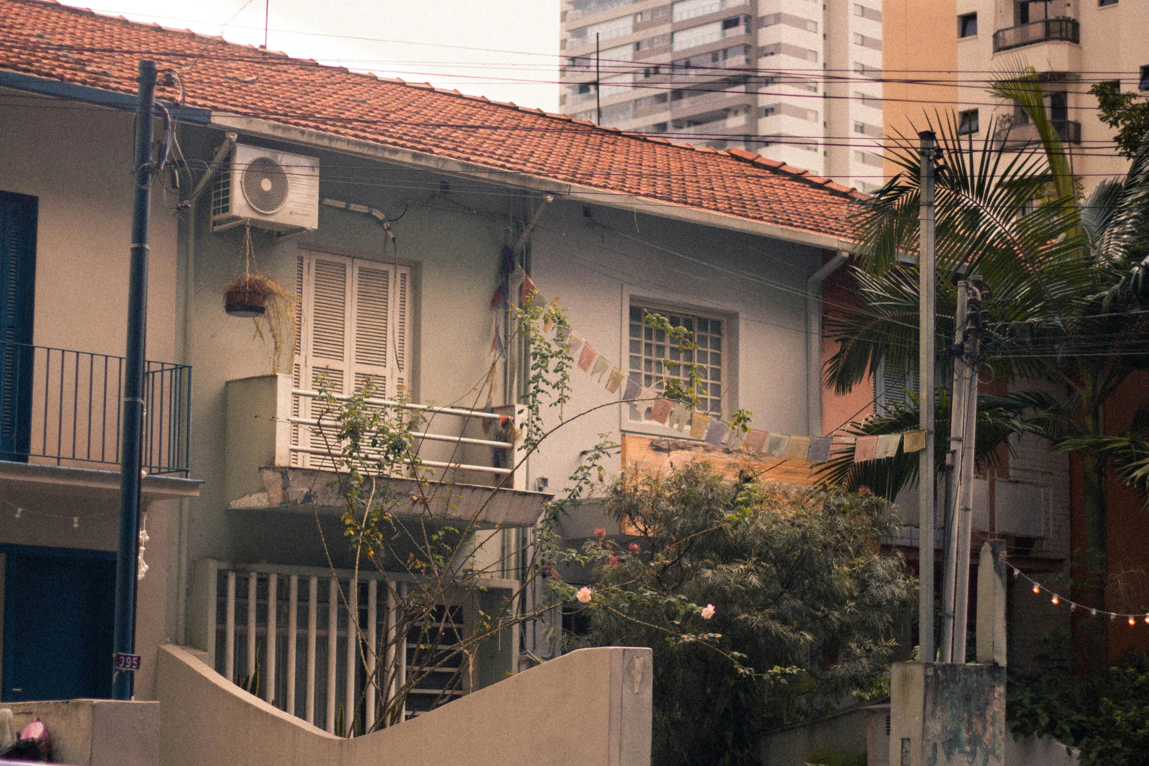 a building with a red tiled roof on it