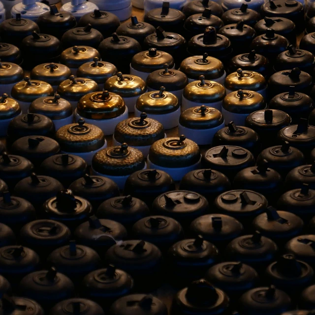 a number of different types of canisters on display