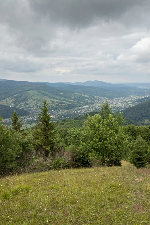 an overview of the city as seen from top of a hill