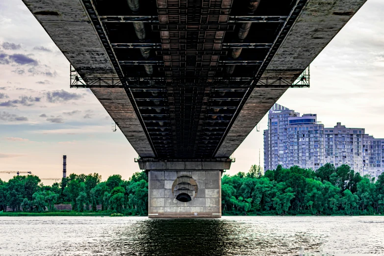 an overpass of a bridge that is over a body of water