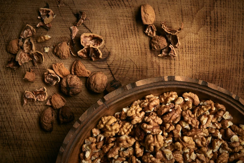 an image of a bowl of nuts on a wooden table