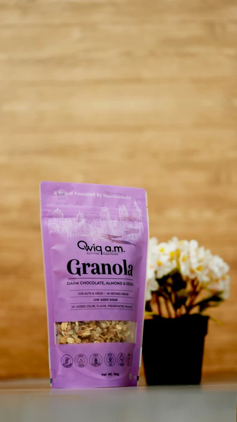 a close up of a bag of granola on a table