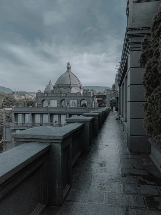 an empty roof walkway in front of a building