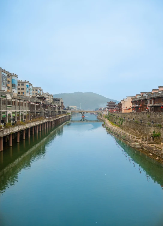 a river with a few piers that are under construction