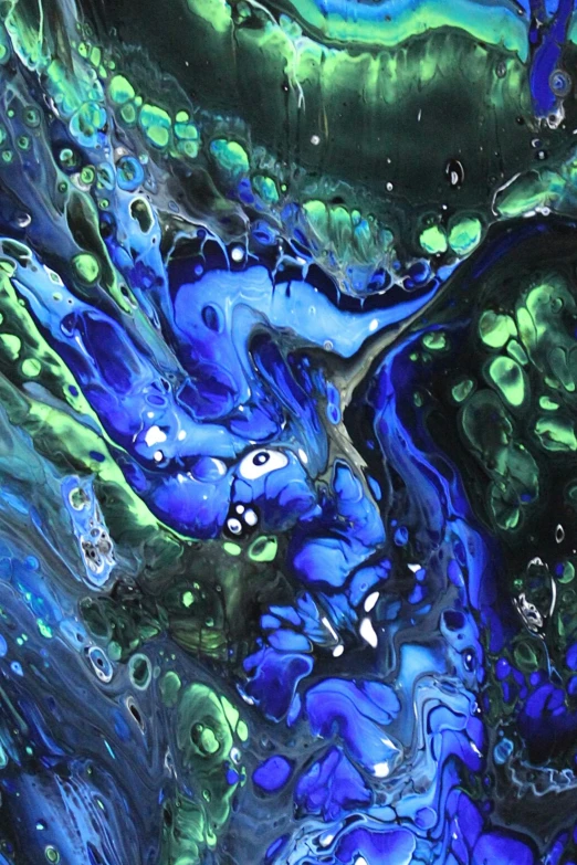 a black blue and green abstract painting with bubbles
