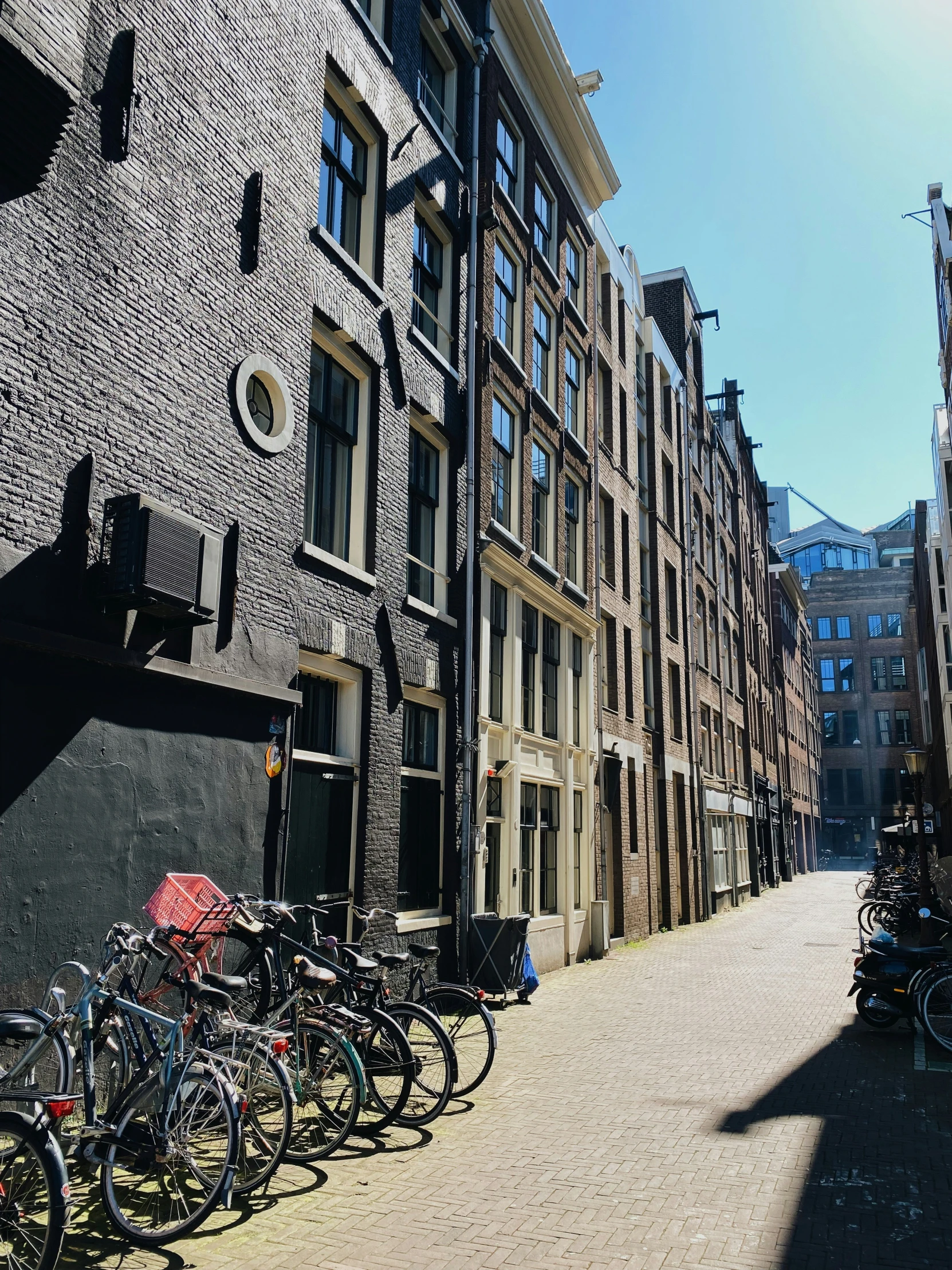 a row of bicycles parked outside an old building