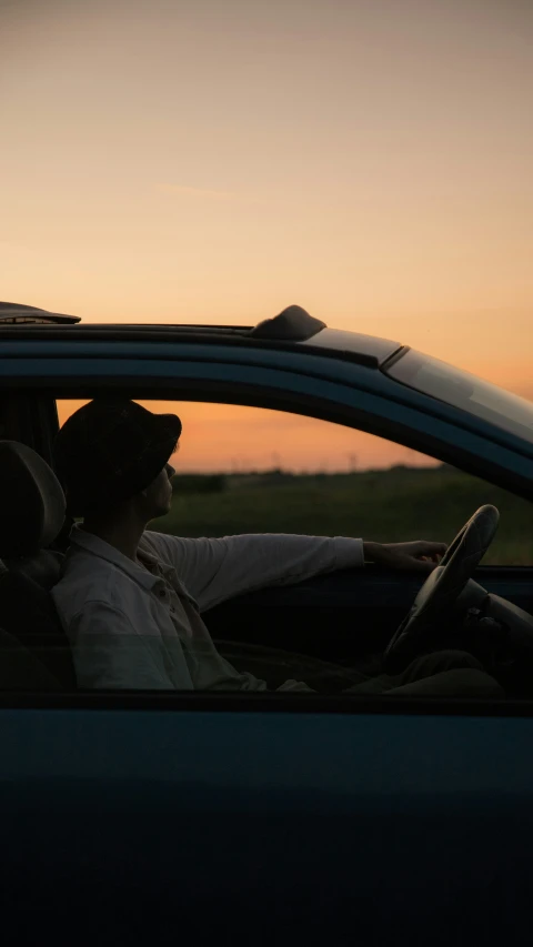 a car dashboard with someone sitting in it