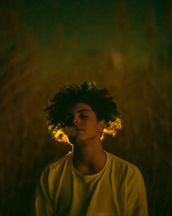 a young person with a head full of flowers on their hair