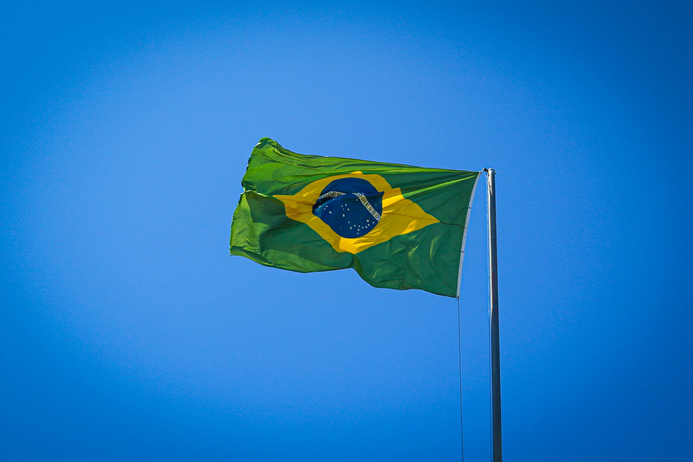 a zil flag flies high on a clear day