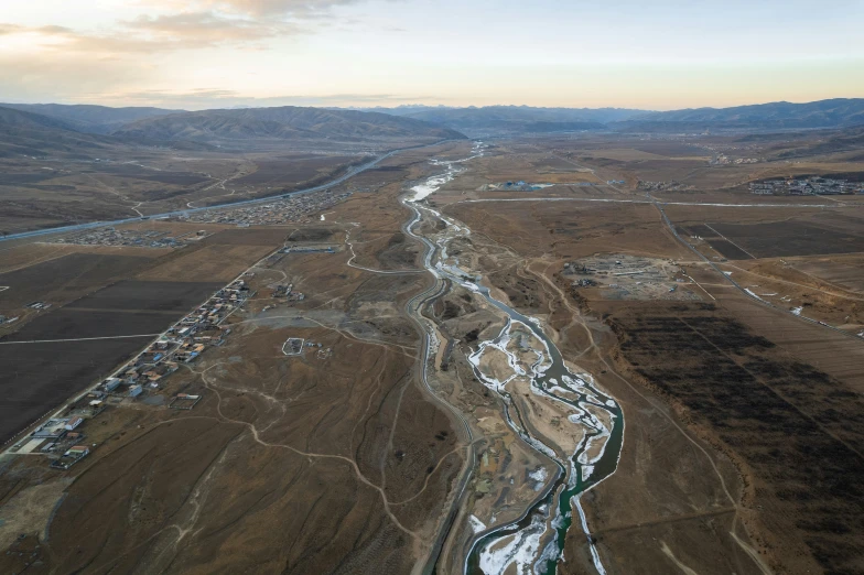 an aerial view of some dirt and brush