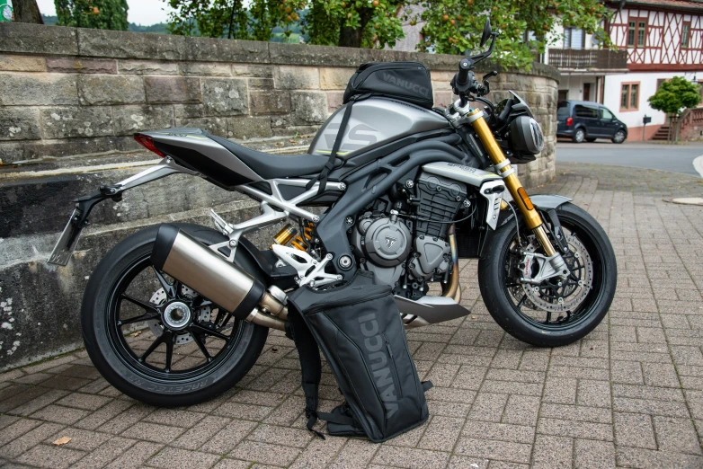 a motorcycle with a side saddle is parked