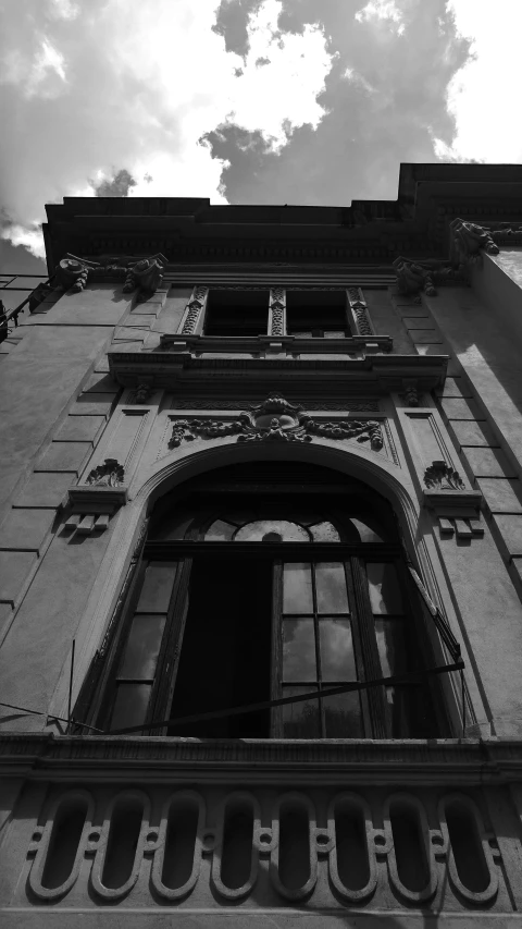 a black and white po of an outside corner of a building