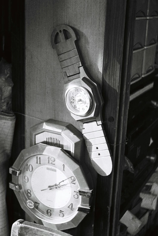 the clocks are arranged to look like they are made from materials