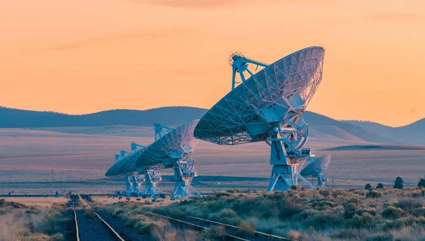 multiple antennas at an outback field in the desert