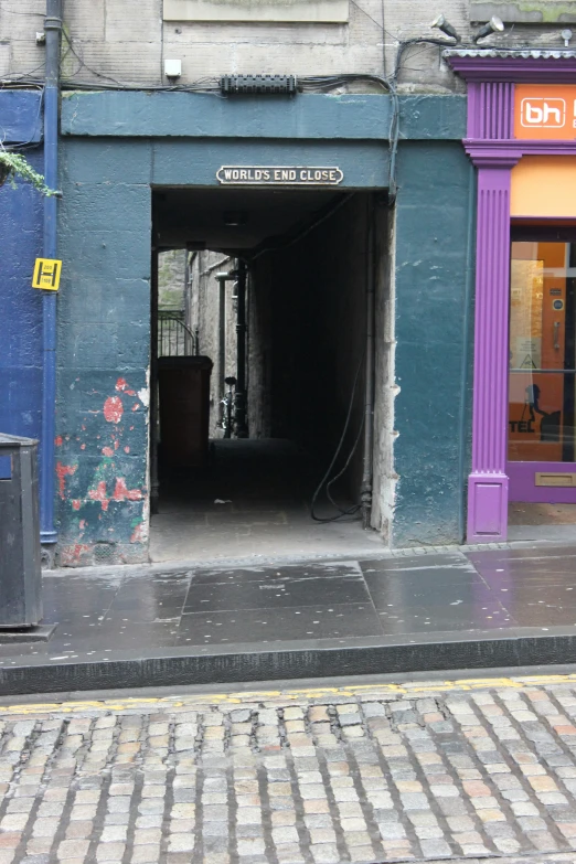 entrance of a building with purple trim around the doorway